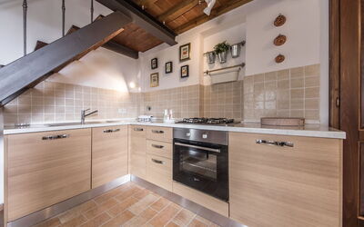 San Gimignano - Villa le Ripe: Brown, Cabinetry, Countertop, Property, Furniture, Building, Kitchen Stove, Wood, Kitchen, Kitchen Appliance