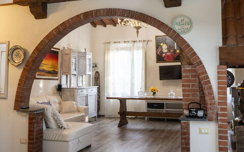 Podere Vallino: Table, Building, Wood, Couch, Interior Design, Picture Frame, Chair, Floor, Living Room, House