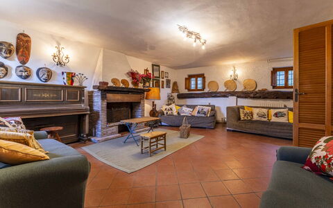 Casale Il Farro - Camaiore, Toscana: Furniture, Picture Frame, Couch, Orange, Table, Interior Design, Studio Couch, Floor, Building, Wood