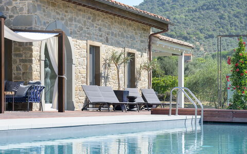 Villa Lilli & Spa: Water, Plant, Furniture, Building, Azure, Swimming Pool, Shade, Outdoor Furniture, Chair, Cottage