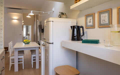 Lucca Old Town Apartment - Lucca, Toscana: Kitchen Appliance, Interior Design, Furniture, Kitchen, Countertop, Wall, Flooring, Major Appliance, Wood, Ceiling