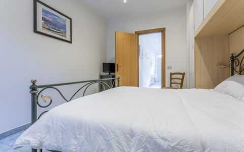 Casa Verdi,near The Beach - Viareggio, Toscana: Property, Furniture, Building, Comfort, Azure, Bed Frame, Wood, Textile, Interior Design, Lamp