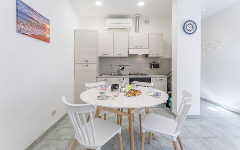 Casa Verdi,near The Beach - Viareggio, Toscana: Table, Furniture, Chair, Building, Interior Design, Kitchen & Dining Room Table, House, Wood, Floor