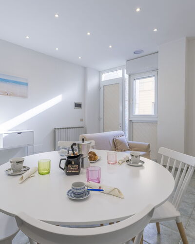 Casa Verdi,near The Beach - Viareggio, Toscana: Table, Furniture, Property, Chair, Tableware, Couch, Building, Interior Design, Kitchen & Dining Room Table, House