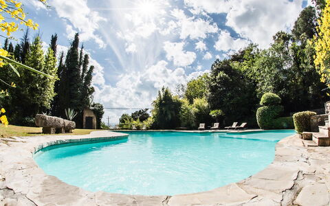 Palazzo Trasimeno: Water, Cloud, Sky, Water Resources, Property, Azure, Natural Landscape, Body Of Water, Plant, Tree