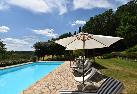 Podere Le Muricce: Cloud, Water, Sky, Plant, Swimming Pool, Umbrella, Tree, Shade, Outdoor Furniture, Chair