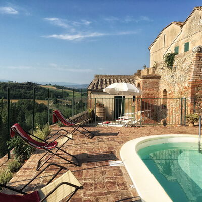 Casa Le Crete: Sky, Water, Property, Building, Cloud, Window, Plant, Swimming Pool, Leisure, Tree