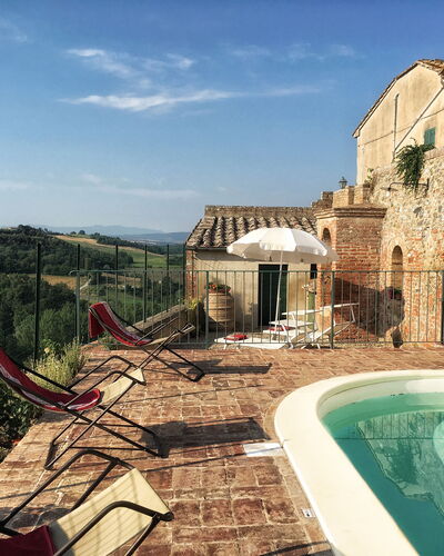 Casa Le Crete: Sky, Water, Property, Building, Cloud, Window, Plant, Swimming Pool, Leisure, Tree