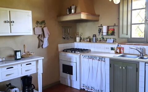 Villa San Giovanni: Cabinetry, Property, Countertop, Kitchen, Kitchen Stove, Wood, Kitchen Appliance, Lighting, Home Appliance, Window