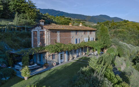 Villa Marlia: Plant, Building, Window, Sky, Tree, Mountain, House, Natural Landscape, Landscape, Grass