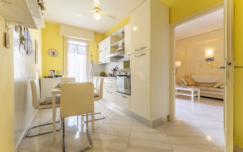 Leandro's House Near Thermal Baths: Furniture, Building, Chair, Yellow, Door, Floor, Window, Flooring