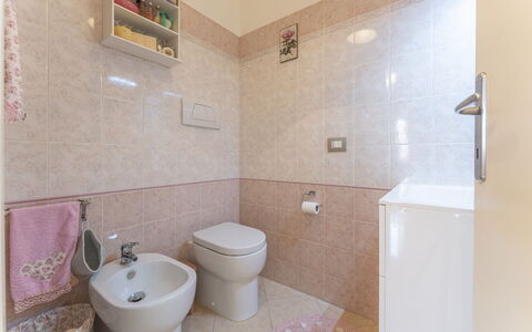 Leandro's House Near Thermal Baths: Plumbing Fixture, Building, Bathroom Sink, Bathroom, Purple, Interior Design, Architecture, Floor, Toilet