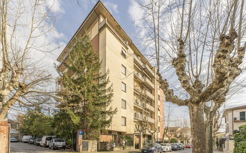 Leandro's House Near Thermal Baths: Sky, Cloud, Building, Window, Wheel, Plant, Tree, Car, Tower Block, Condominium