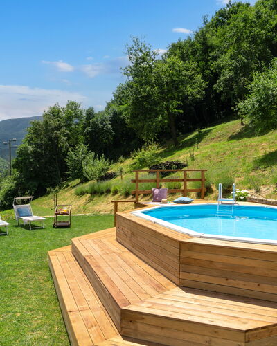 Villa Dei Tigli: Water, Plant, Sky, Swimming Pool, Tree, Cloud, Outdoor Furniture, Building, Natural Landscape, Shade