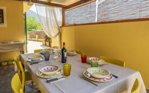Camaiore House With Pool, La Casa Dei Ricci: Table, Food, Tableware, Furniture, Window, Chair, Tablecloth, Bottle, Building, Dishware