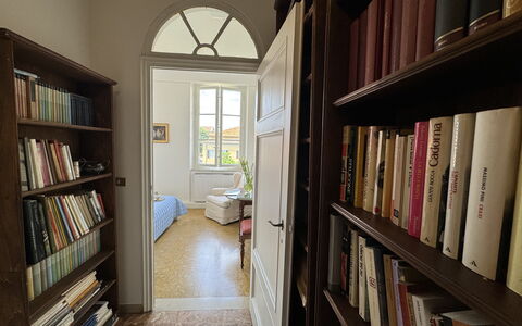 Piazza S. Romano: Bookcase, Shelf, Property, Book, Publication, Shelving, Wood, Window, Interior Design