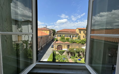 Piazza S. Romano: Cloud, Sky, Property, Building, Interior Design, Architecture, Shade, Material Property, Real Estate