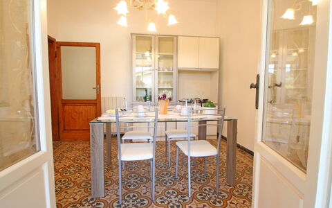 Casa Leonardo: Furniture, Table, Wood, Lighting, Interior Design, Chair, Floor, Wall, Flooring
