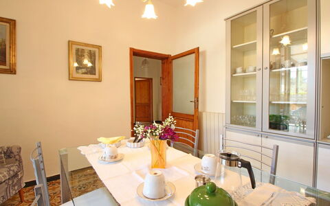 Casa Leonardo: Furniture, Property, Table, Tableware, Picture Frame, Interior Design, Lighting, Wood, Chair, Door