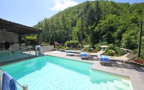 Villa La Rocca: Water, Property, Plant, Cloud, Swimming Pool, Sky, Azure, Chair, Tree, Outdoor Furniture