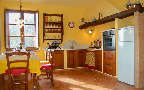 Villa Gelsomino: Furniture, Table, Cabinetry, Window, Chair, Wood, Architecture, Countertop, Drawer, Kitchen
