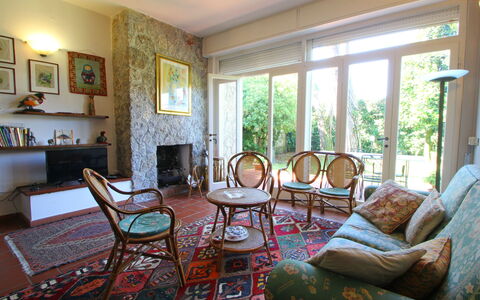 Casa La Pineta: Furniture, Property, Picture Frame, Couch, Chair, Interior Design, Wood, Architecture, Floor, Flooring