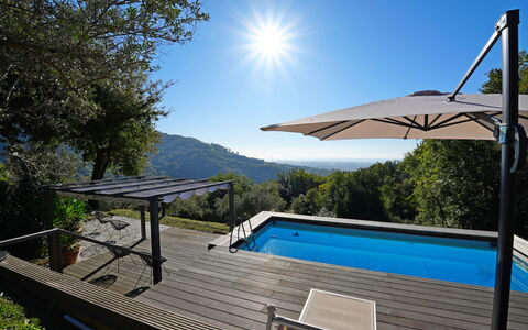 Villa Di Confine: Sky, Plant, Water, Light, Nature, Shade, Swimming Pool, Outdoor Furniture, Lighting, Tree