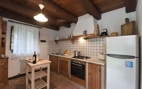 Villa Del Mulino: Cabinetry, Property, Countertop, Kitchen Stove, Kitchen, Kitchen Appliance, Wood, Interior Design, Stove, Cooktop