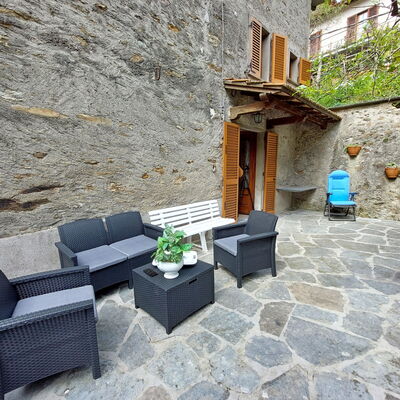 Casa Le Grotte: Plant, Building, Window, Flowerpot, Houseplant, Couch, Architecture, Outdoor Furniture, Road Surface, House