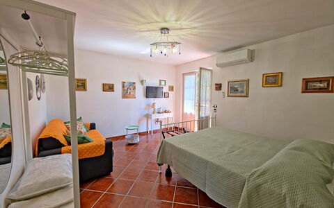 Casa Luigi: Furniture, Interior Design, Floor, Flooring, Bed, Wall, Bedroom, Ceiling, Room, Wood
