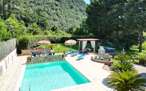 Casa Luigi: Water, Plant, Swimming Pool, Nature, Azure, Sky, Tree, Leisure, Outdoor Furniture, Aqua