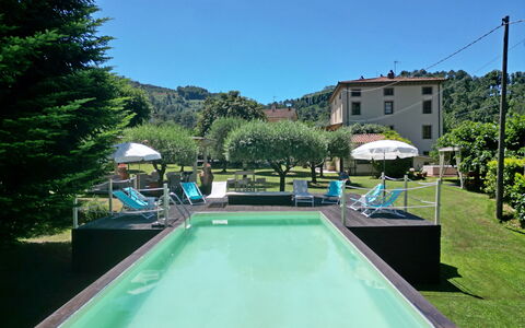 Villa L'antico Casale: Water, Sky, Plant, Property, Building, Tree, Swimming Pool, Shade, Grass, Leisure
