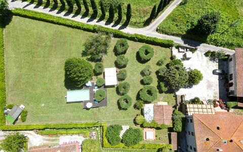 Villa L'antico Casale: Plant, Green, Land Lot, Tree, Urban Design, Grass, Biome, Natural Landscape, Rural Area, House