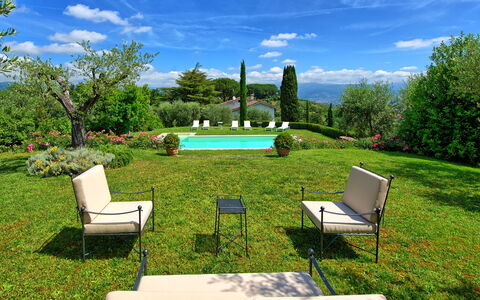 Villa Mami: Sky, Plant, Cloud, Furniture, Water, Property, Green, Tree, Natural Landscape, Outdoor Furniture