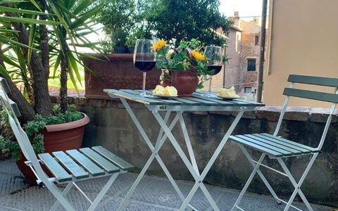 Bocelli: Plant, Table, Furniture, Building, Flowerpot, Outdoor Table, Chair, Outdoor Furniture, Flower, Wood