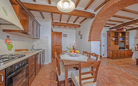 La Montana: Table, Furniture, Property, Cabinetry, Chair, Wood, Orange, Interior Design, Architecture, Kitchen