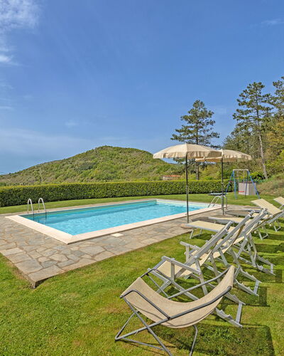 La Montanina: Sky, Water, Plant, Cloud, Natural Landscape, Swimming Pool, Tree, Outdoor Furniture, Land Lot, Shade