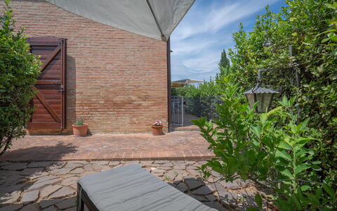 Torri 15 Holiday Home: Plant, Property, Sky, Cloud, Road Surface, Shade, Wood, Cottage, Grass, Building