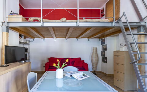 Florentine Careggi Loft: Table, Furniture, Property, Building, Textile, Wood, Chair, Interior Design, Tableware, Architecture