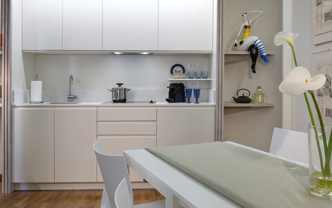 Butterfly With Beach & Breakfast Included: Property, Furniture, Cabinetry, White, Table, Interior Design, Plant, Shelving, Flower