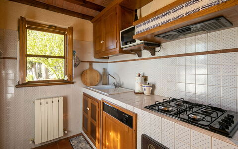 La Maggiolina & La Bastide: Countertop, Cabinetry, Property, Kitchen Appliance, Window, Gas Stove, Kitchen, Kitchen Stove, Building, Wood