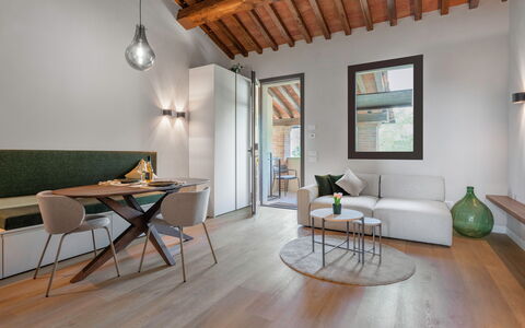 Correggiolo Spereto Apartment With Pool, Montaione: Table, Furniture, Property, Couch, Window, Wood, Living Room, Interior Design, Lighting, Flooring
