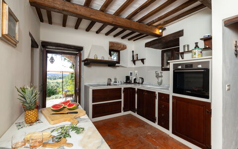 Villa Delle Rose: Property, Cabinetry, Building, Plant, Countertop, Wood, Interior Design, Living Room, Kitchen, Window
