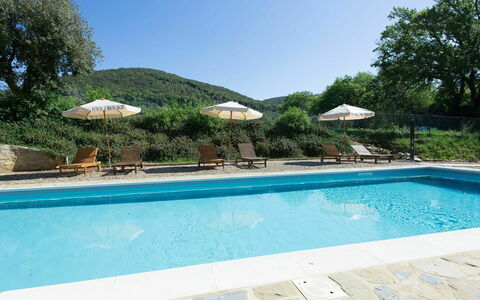 Casa Minuccia: Water, Plant, Property, Sky, Swimming Pool, Azure, Tree, Building, Shade, Umbrella