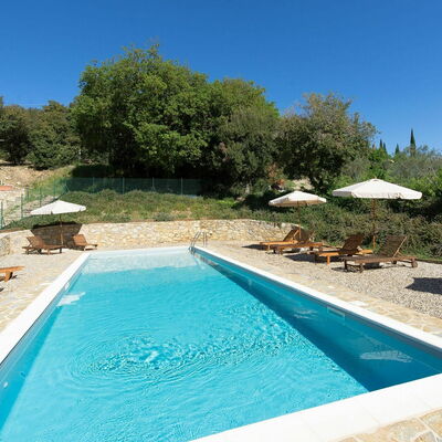Casa Minuccia: Water, Property, Plant, Furniture, Sky, Swimming Pool, Azure, Shade, Chair, Outdoor Furniture