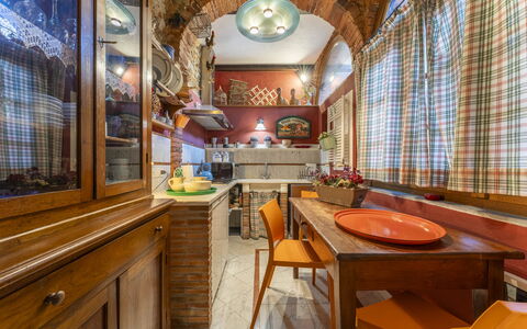 Lounge Flat Camaiore, Wifi, Versilia Coast: Table, Furniture, Property, Wood, Interior Design, Chair, Lighting, Cabinetry, Building, Window