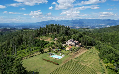 Montelucci Chianti Agrivilla: Cloud, Sky, Plant, Mountain, Natural Landscape, Tree, Land Lot, Highland, Building, Grass
