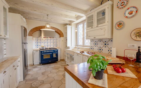 Montelucci Chianti Agrivilla: Cabinetry, Property, Countertop, Kitchen, Wood, Interior Design, Architecture, Table, Floor, Flooring