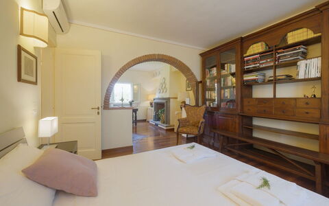 Villa Elena: Furniture, Interior Design, Flooring, Floor, Ceiling, Wood, Room, Bed, Bedroom, Lighting