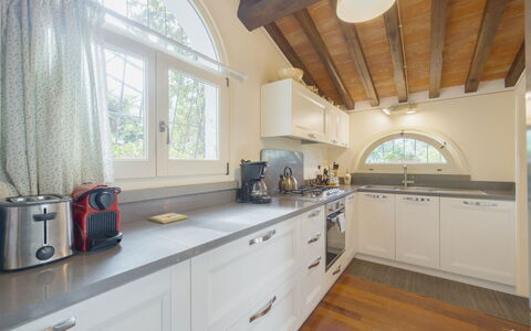 Villa Elena: Kitchen, Interior Design, Countertop, Wood, Ceiling, Kitchen Appliance, Cabinetry, Flooring, Major Appliance, Furniture